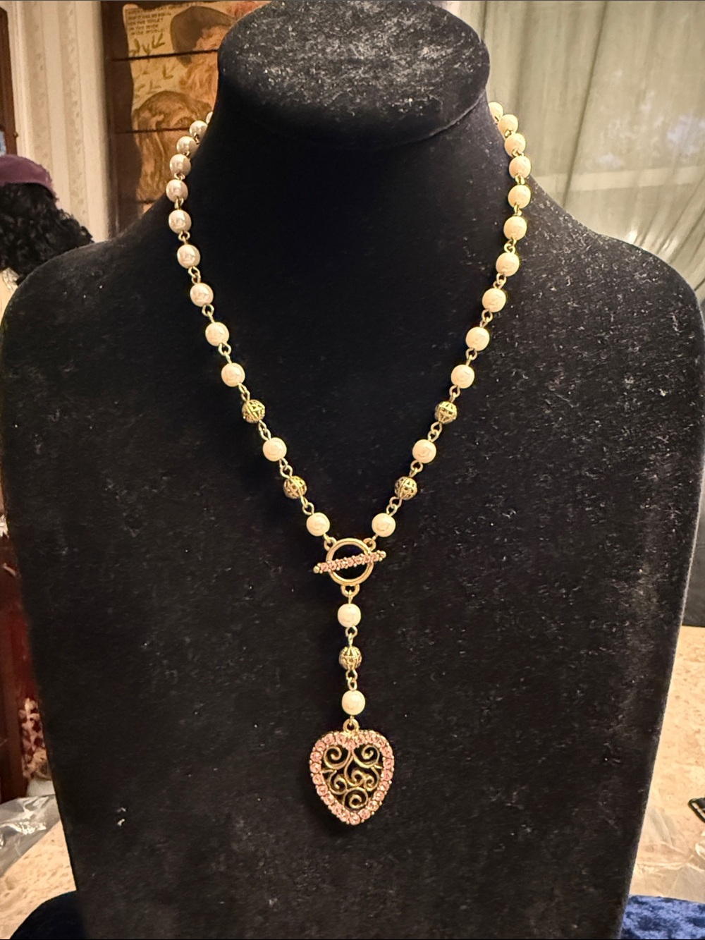 Vintage 1928 brand faux, pearl and gold tone station necklace, heart pendant